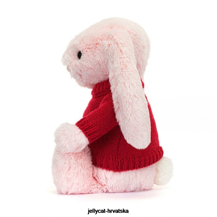 Jellycat sramežljivi ružičasti zeko s personaliziranim crvenim džemperom dječje ružičaste boje 172 igračka