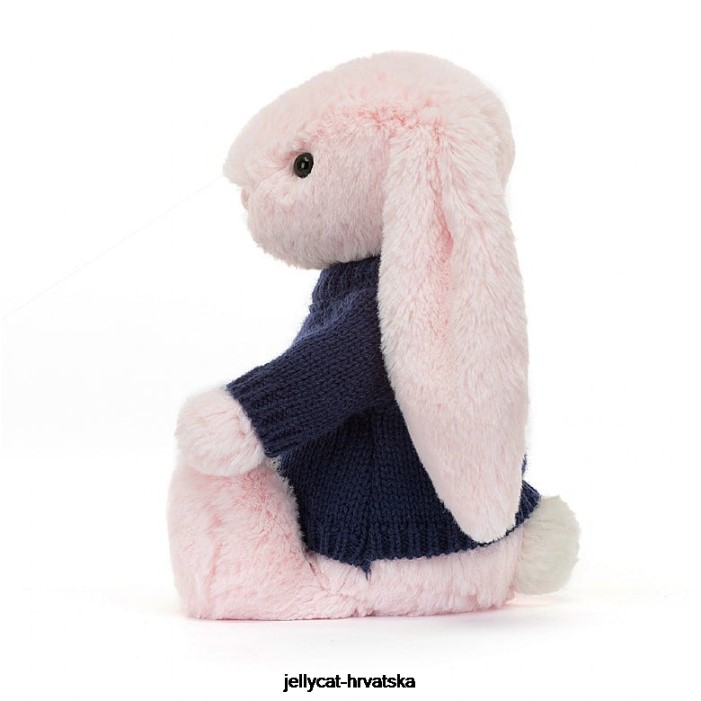 Jellycat sramežljivi ružičasti zeko s personaliziranim tamnoplavim džemperom dječje ružičaste boje 398 igračka