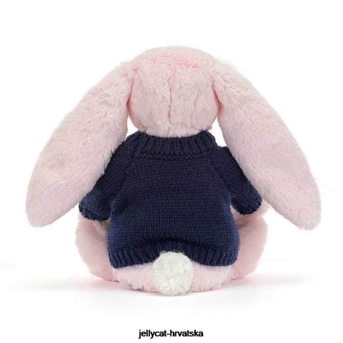Jellycat sramežljivi ružičasti zeko s personaliziranim tamnoplavim džemperom dječje ružičaste boje 398 igračka